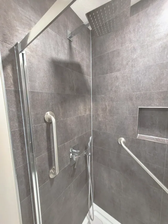 Barrier-free shower with grab bars and rain head, Calgary
